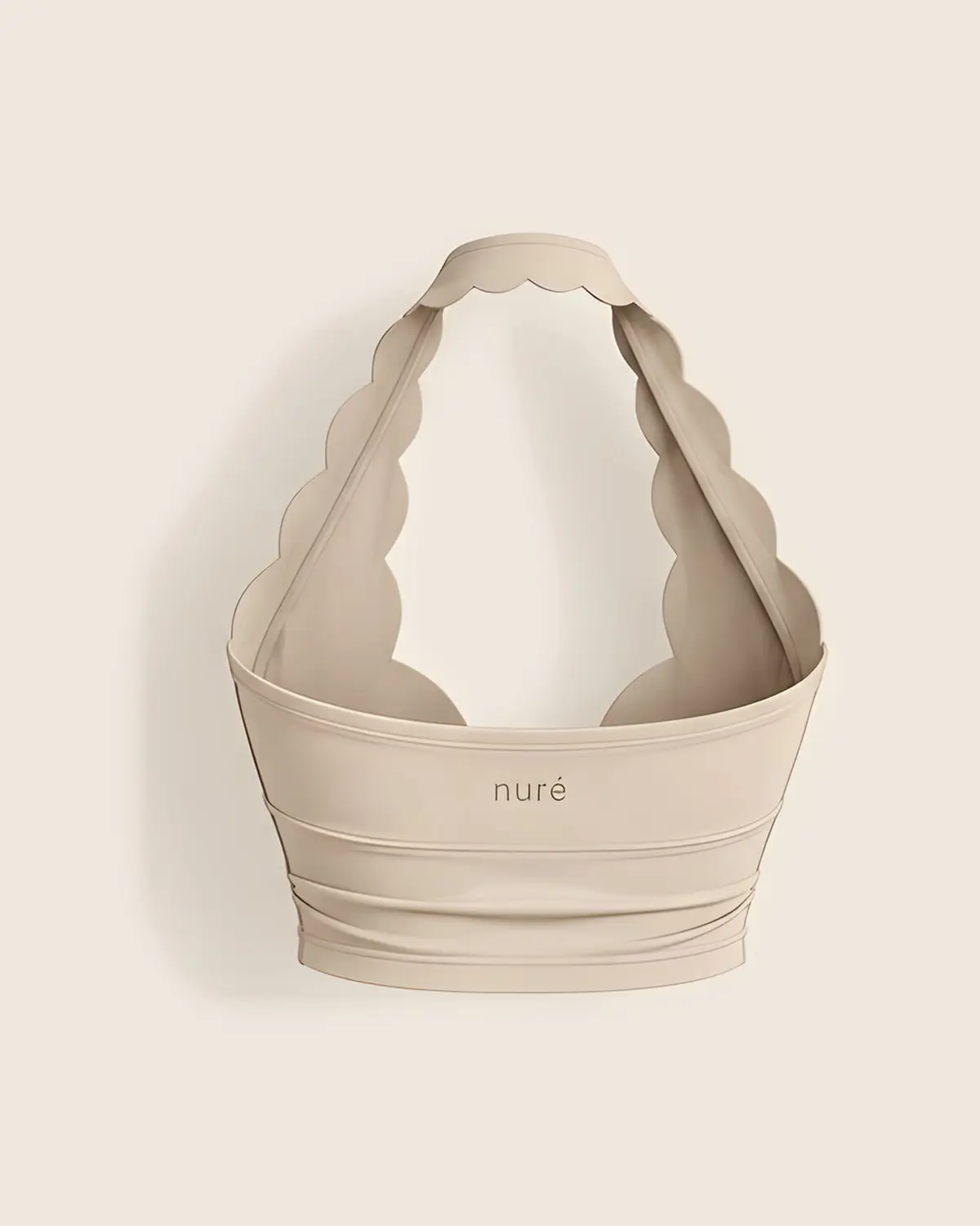 Krem halter yakalı, fisto kenarlı crop üst, arkadan; sırtta nuré logosu